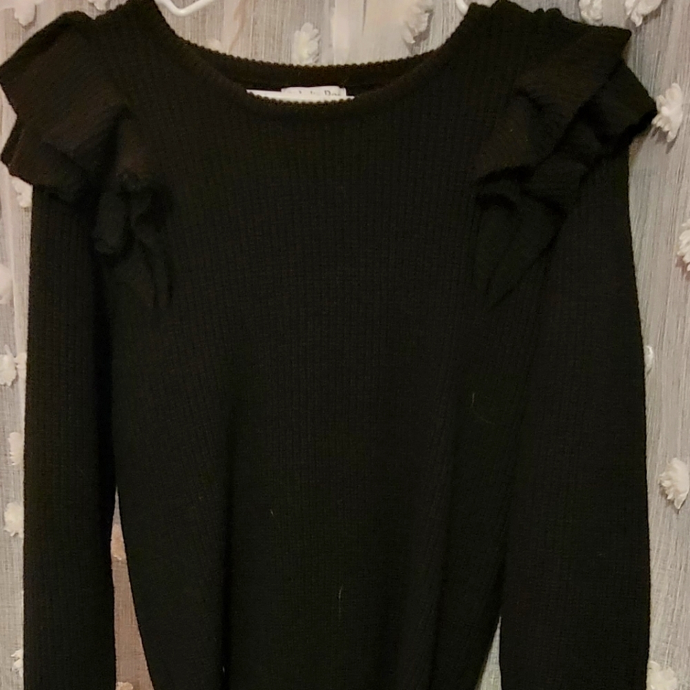 Black ruffle shirt